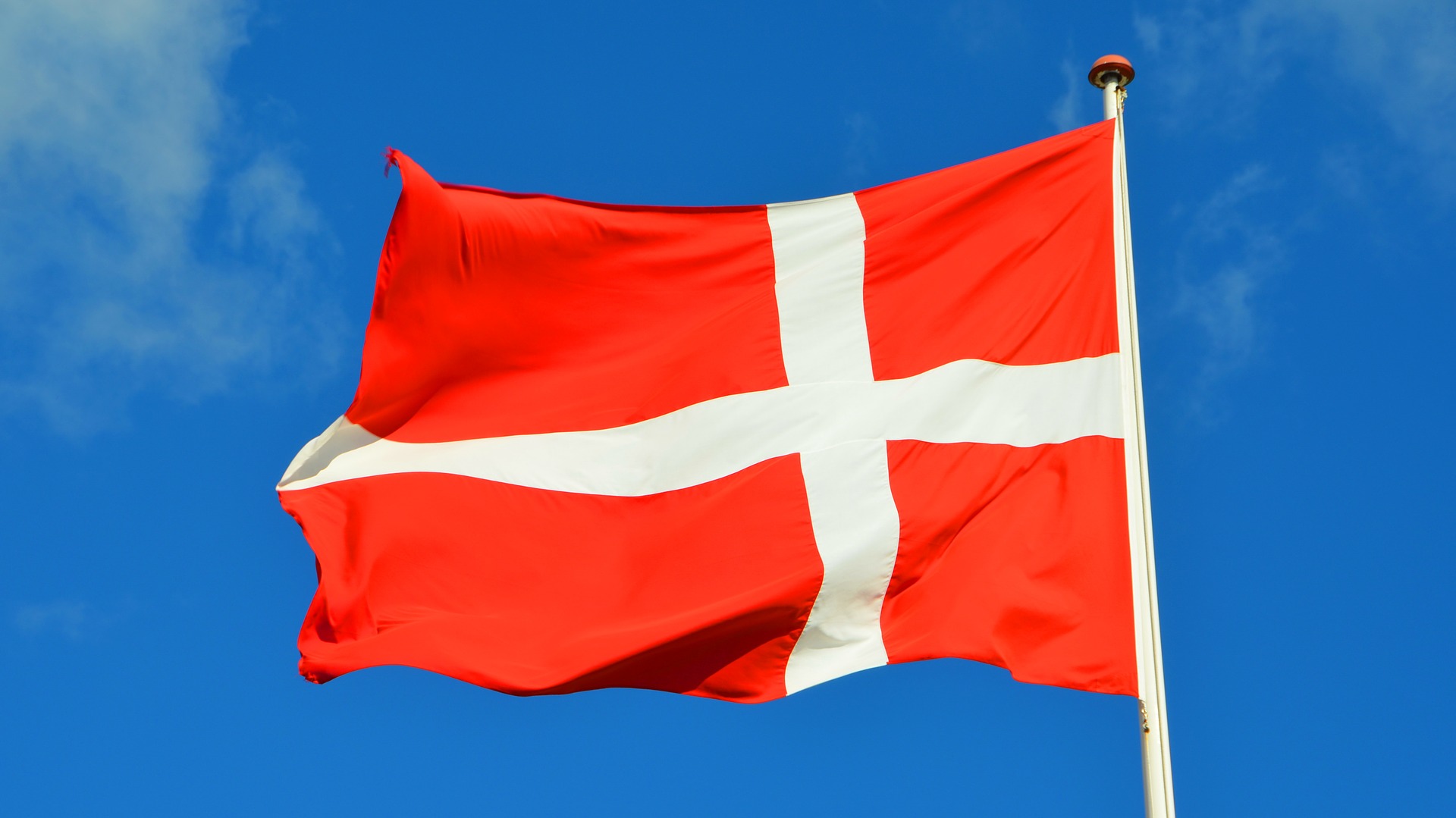 white cross red background flag